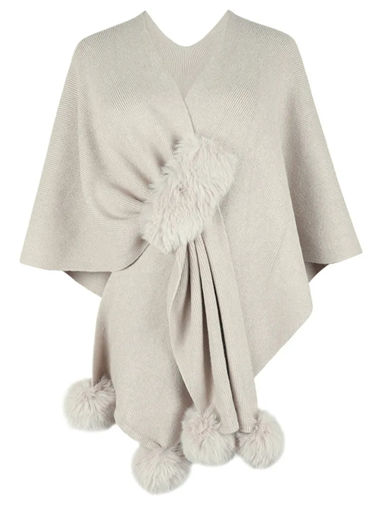 Poncho avec Pompon